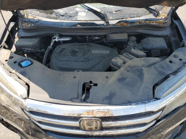 Photo 12 from auction – 2016 HONDA PILOT TOURING with VIN 5FNYF5H91GB024157