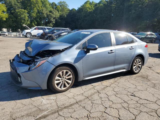 TOYOTA COROLLA LE 2023 with VIN JTDB4MEE3P3011687 - Photo from auction