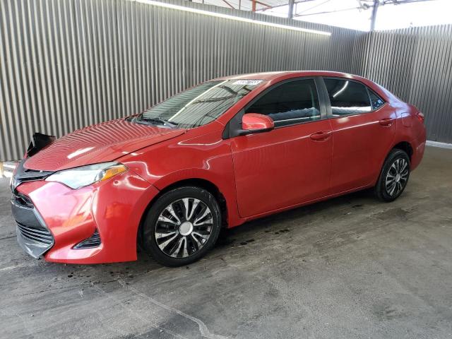 TOYOTA COROLLA LE 2019 with VIN 5YFBURHE8KP943957 - Photo from auction