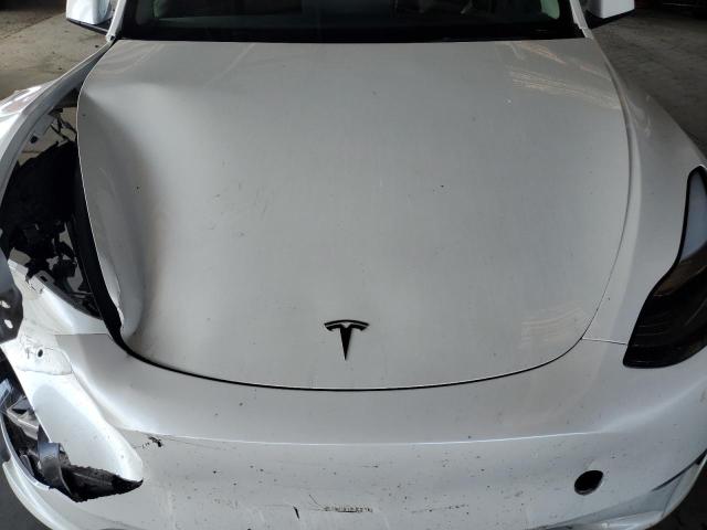 Photo 11 from auction – 2022 TESLA MODEL Y with VIN 7SAYGDEF5NF313642