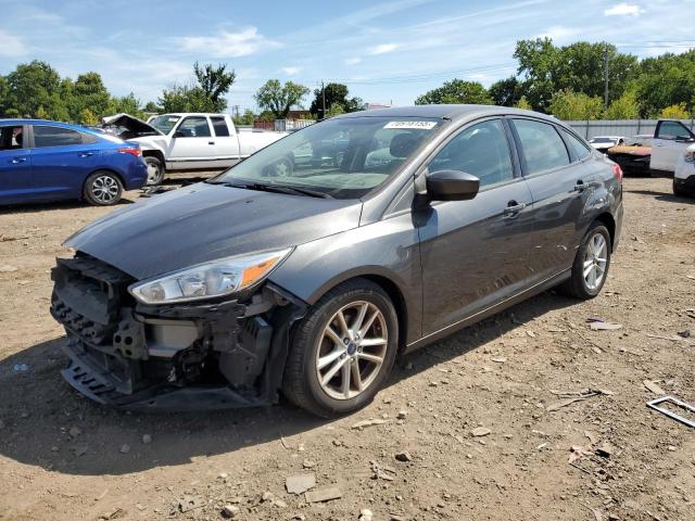 FORD FOCUS SE 2018 with VIN 1FADP3F20JL209848 - Photo from auction