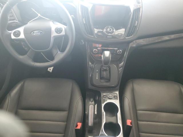 Photo 8 from auction – 2016 FORD ESCAPE TIT with VIN 1FMCU9JX3GUB05681