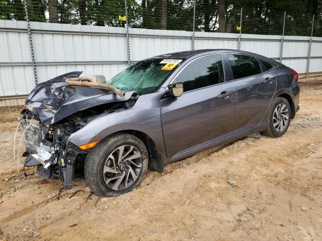 HONDA CIVIC EX 2017 with VIN 19XFC2F77HE004065 - Photo from auction