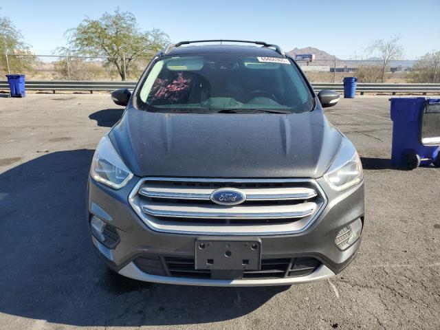 Photo 5 from auction – 2018 FORD ESCAPE TIT with VIN 1FMCU0J95JUA10317