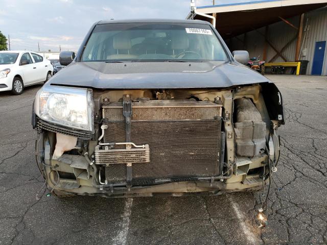 Photo 5 from auction – 2011 HONDA PILOT TOURING with VIN 5FNYF4H91BB033217