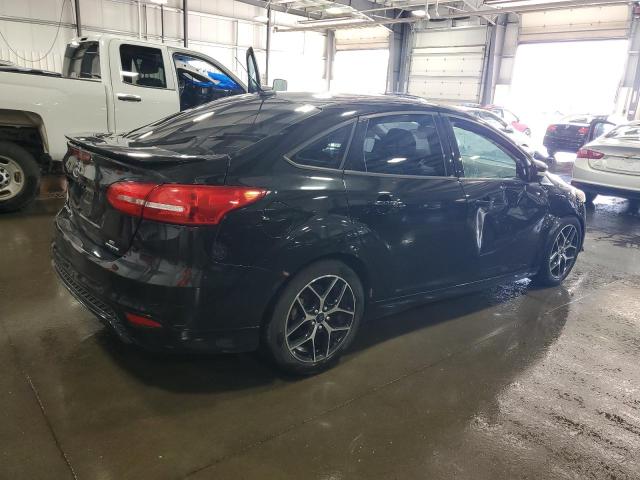 Photo 3 from auction – 2015 FORD FOCUS SE with VIN 1FADP3F27FL214603