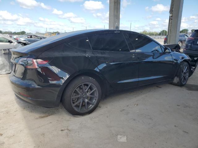 Photo 3 from auction – 2023 TESLA MODEL 3 with VIN 5YJ3E1EAXPF670348