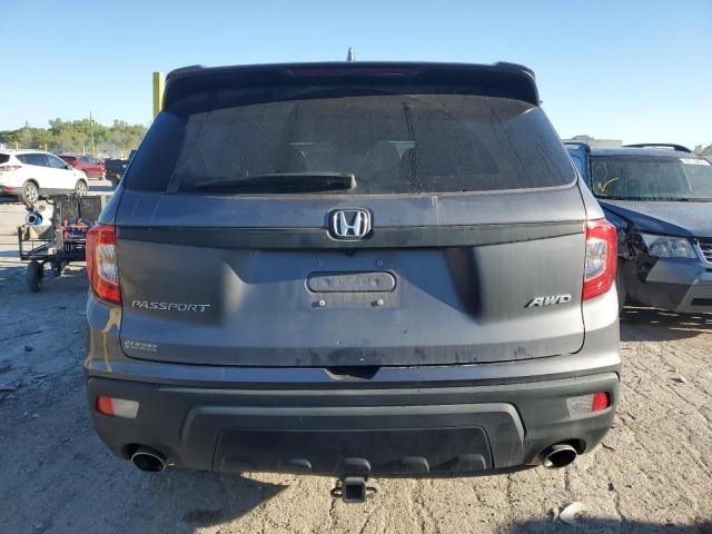Photo 6 from auction – 2021 HONDA PASSPORT E with VIN 5FNYF8H5XMB006783