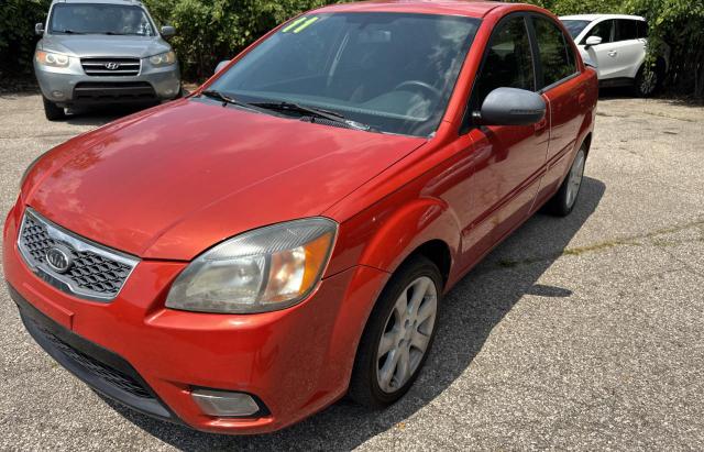 Photo 2 from auction – 2011 KIA RIO BASE with VIN KNADH4A33B6939277