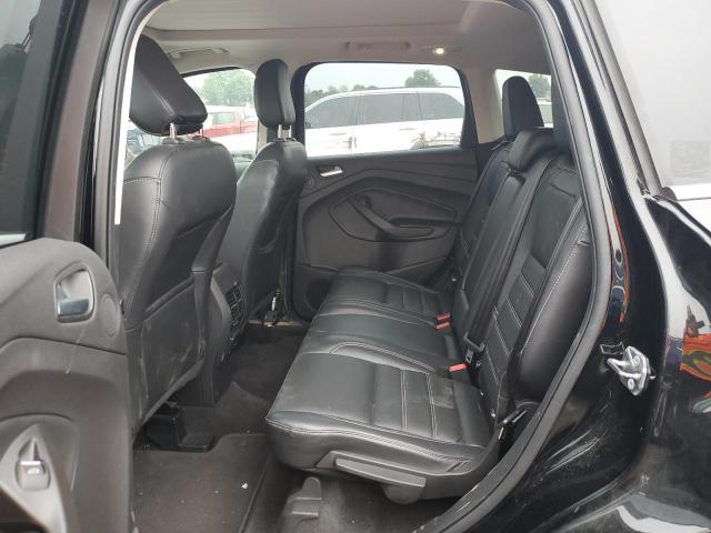 Photo 11 from auction – 2018 FORD ESCAPE TIT with VIN 1FMCU9J95JUC25099
