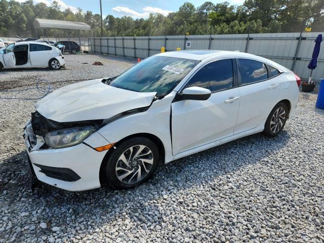 HONDA CIVIC EX 2018 with VIN 19XFC2F78JE034052 - Photo from auction