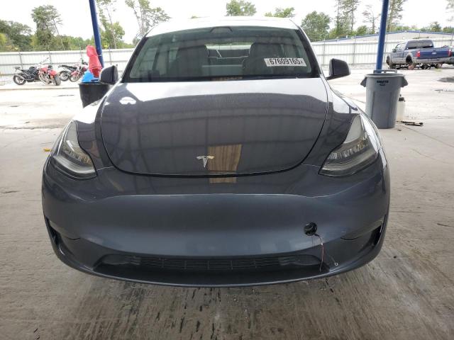 Photo 5 from auction – 2023 TESLA MODEL Y with VIN 7SAYGDEE8PA033835