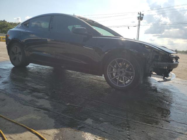 Photo 4 from auction – 2023 TESLA MODEL 3 with VIN 5YJ3E1EA1PF458230