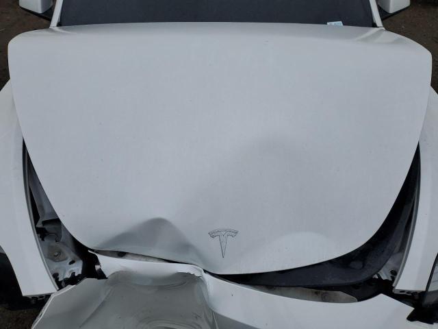 Photo 12 from auction – 2023 TESLA MODEL Y with VIN 7SAYGDEE6PA068809