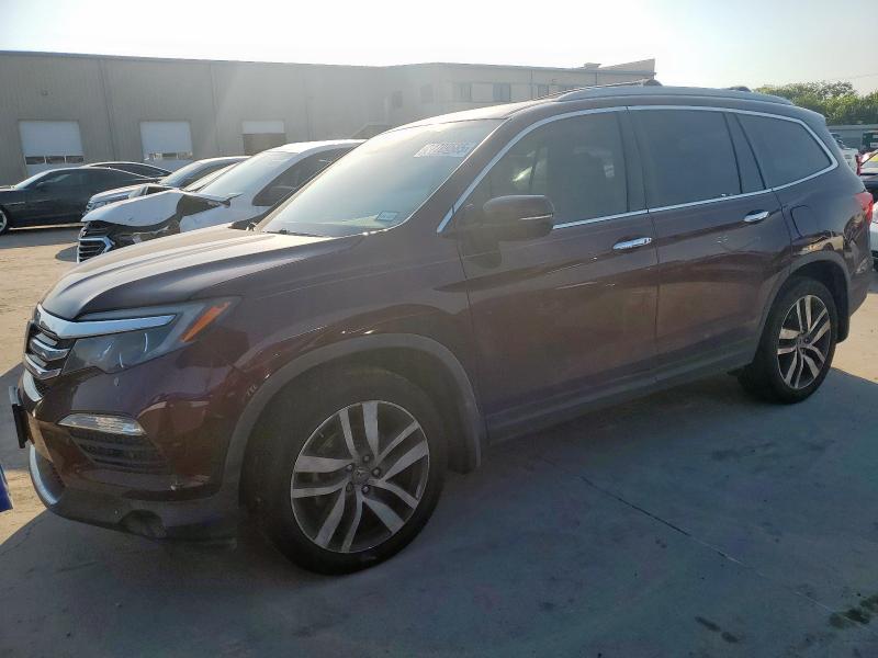 HONDA PILOT TOUR 2017 with VIN 5FNYF6H91HB042049 - Photo from auction