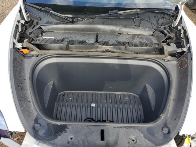 Photo 11 from auction – 2023 TESLA MODEL Y with VIN 7SAYGDEE5PA054268