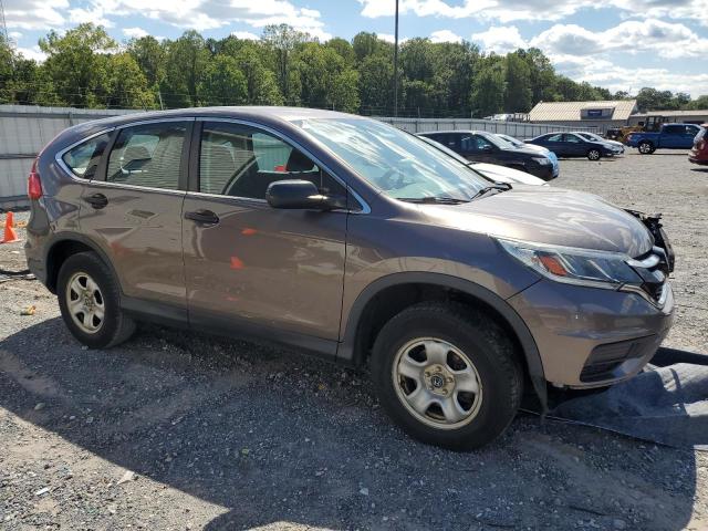 Photo 4 from auction – 2015 HONDA CR-V LX with VIN 2HKRM4H36FH601734