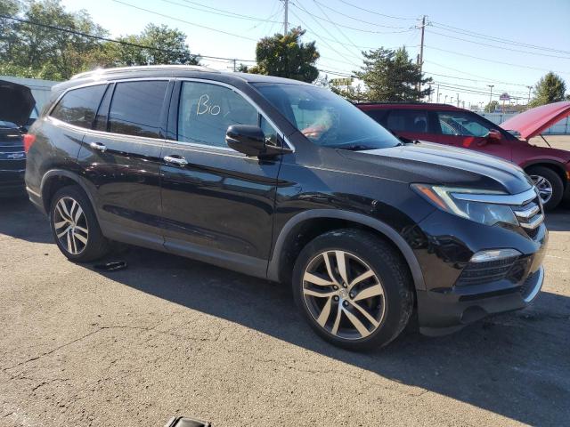 Photo 4 from auction – 2017 HONDA PILOT ELIT with VIN 5FNYF6H06HB054876