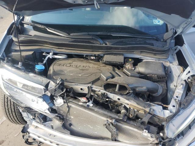 Photo 12 from auction – 2022 HONDA PILOT TOUR with VIN 5FNYF6H63NB077922