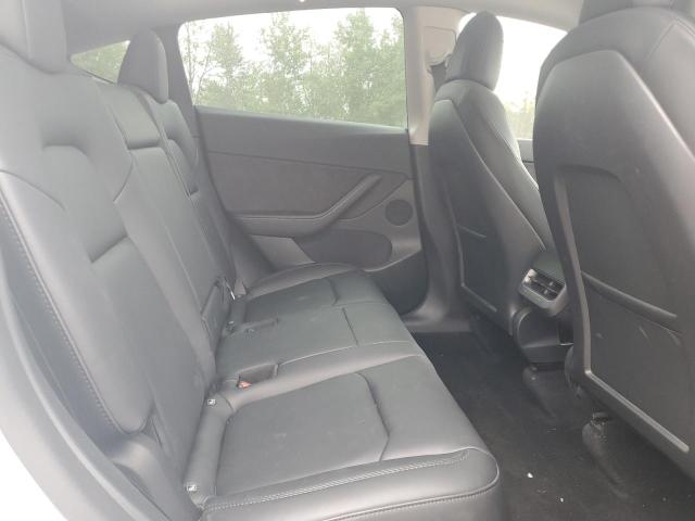 Photo 11 from auction – 2022 TESLA MODEL Y with VIN 7SAYGDEE9NF514144
