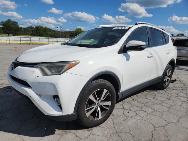 TOYOTA RAV4 XLE 2016 with VIN JTMWFREV9GJ064172 - Photo from auction