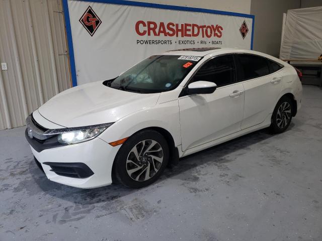 HONDA CIVIC EX 2017 with VIN 19XFC2F79HE064302 - Photo from auction