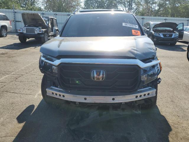Photo 5 from auction – 2021 HONDA RIDGELINE with VIN 5FPYK3F76MB020660
