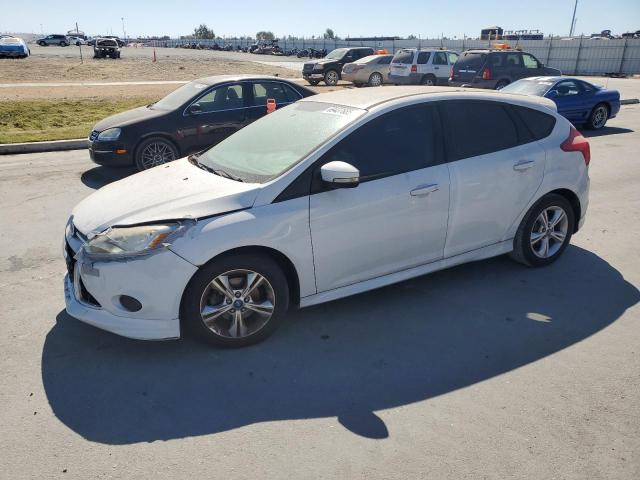 FORD FOCUS SE 2013 with VIN 1FADP3K20DL264875 - Photo from auction