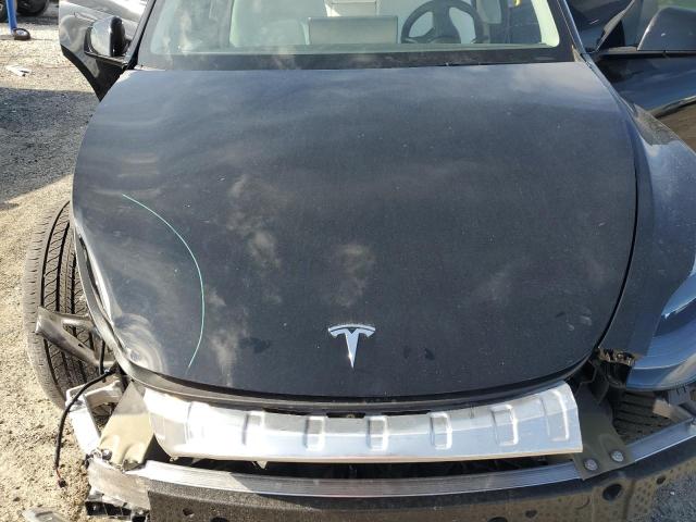 Photo 11 from auction – 2024 TESLA MODEL Y with VIN 7SAYGAEEXRF021660