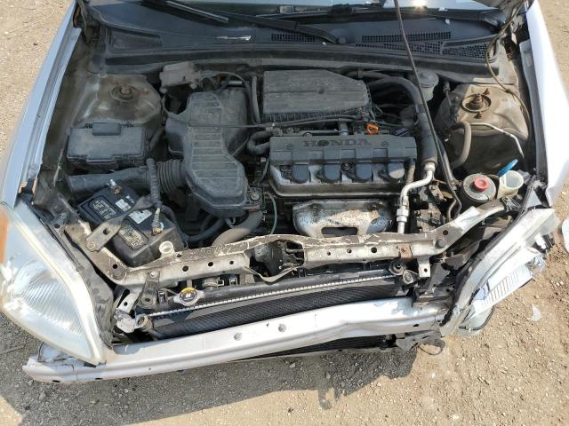 Photo 11 from auction – 2003 HONDA CIVIC LX with VIN 1HGEM225X3L015415
