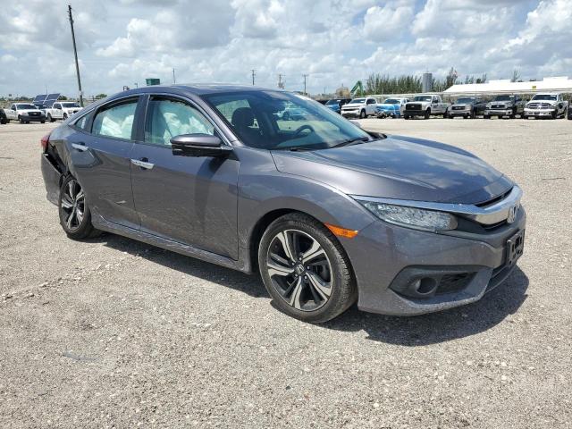 Photo 4 from auction – 2016 HONDA CIVIC TOUR with VIN 2HGFC1F93GH656200
