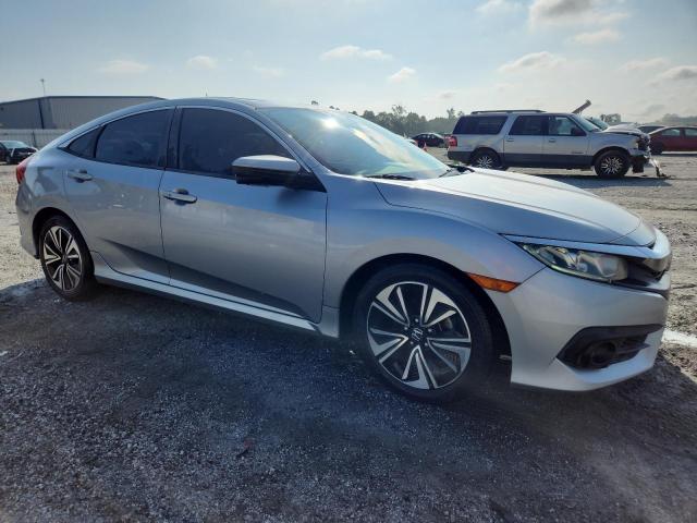 Photo 4 from auction – 2016 HONDA CIVIC EXL with VIN 19XFC1F72GE020134