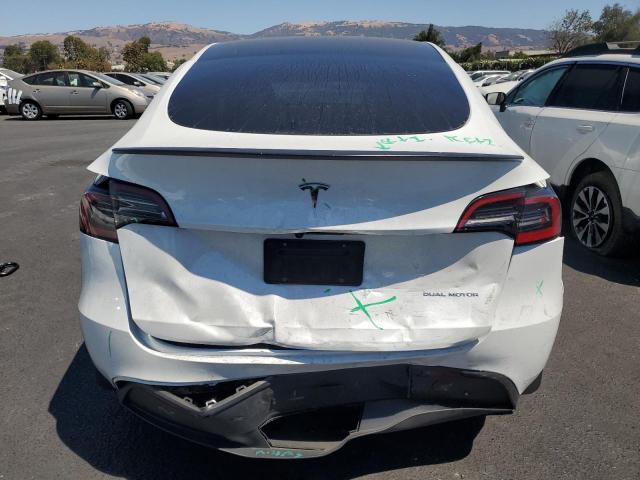 Photo 6 from auction – 2023 TESLA MODEL Y with VIN 7SAYGDEE1PF691225