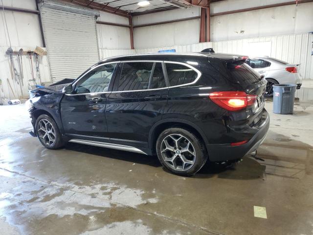 Photo 2 from auction – 2017 BMW X1 XDRIVE2 with VIN WBXHT3C30H5F79819