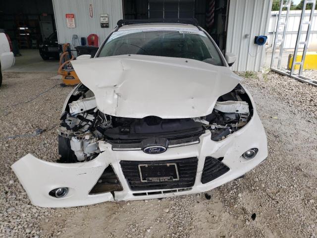 Photo 5 from auction – 2014 FORD FOCUS TITA with VIN 1FADP3N2XEL118481