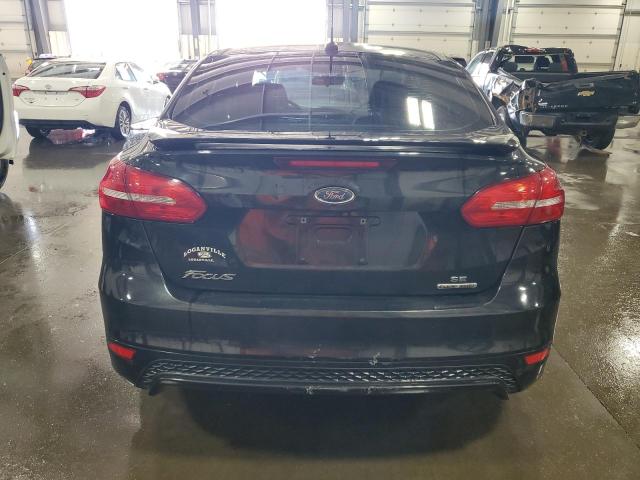 Photo 6 from auction – 2015 FORD FOCUS SE with VIN 1FADP3F27FL214603