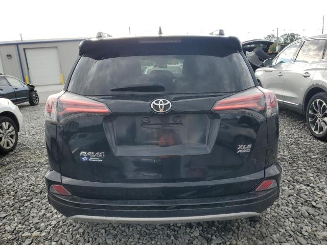 Photo 6 from auction – 2016 TOYOTA RAV4 XLE with VIN 2T3RFREV6GW457089
