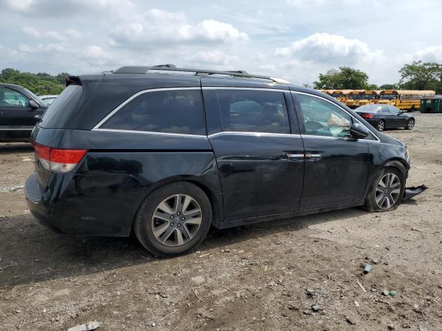 Photo 3 from auction – 2014 HONDA ODYSSEY TO with VIN 5FNRL5H91EB099693