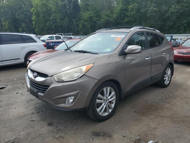 HYUNDAI TUCSON GLS 2012 with VIN KM8JUCAC4CU534839 - Photo from auction