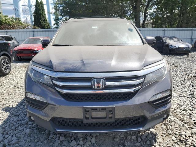 Photo 5 from auction – 2017 HONDA PILOT TOUR with VIN 5FNYF6H97HB099839