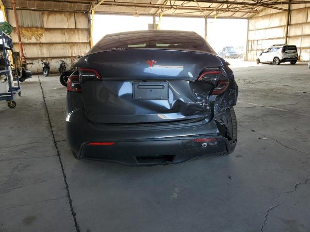 Photo 6 from auction – 2023 TESLA MODEL Y with VIN 7SAYGAEEXPF832176