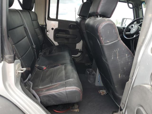Photo 11 from auction – 2010 JEEP WRANGLER U with VIN 1J4BA5H15AL123254