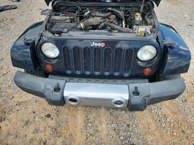 Photo 12 from auction – 2011 JEEP WRANGLER U with VIN 1J4BA5H15BL543100