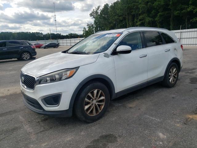 KIA SORENTO LX 2016 with VIN 5XYPG4A3XGG114635 - Photo from auction