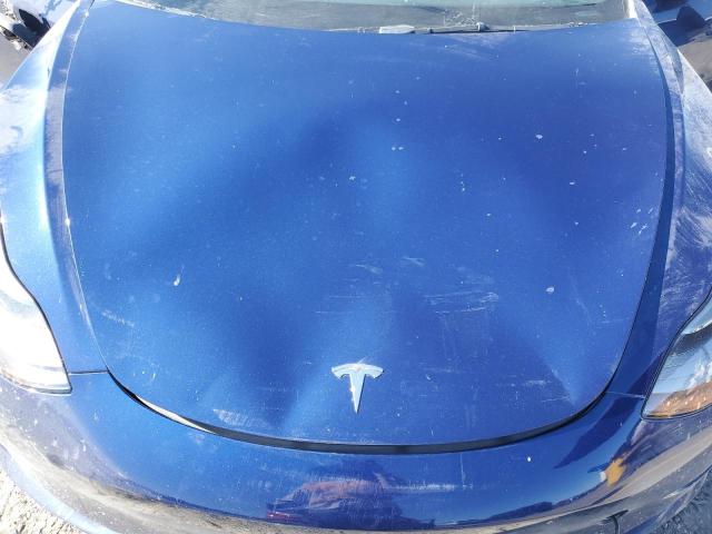 Photo 11 from auction – 2022 TESLA MODEL 3 with VIN 5YJ3E1EA0NF304153