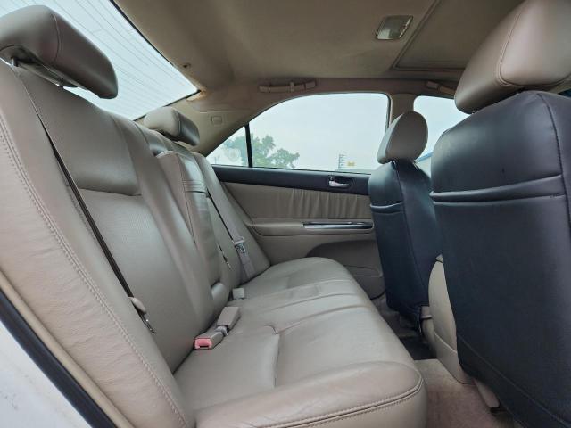 Photo 10 from auction – 2002 TOYOTA CAMRY LE with VIN 4T1BF30K42U028384