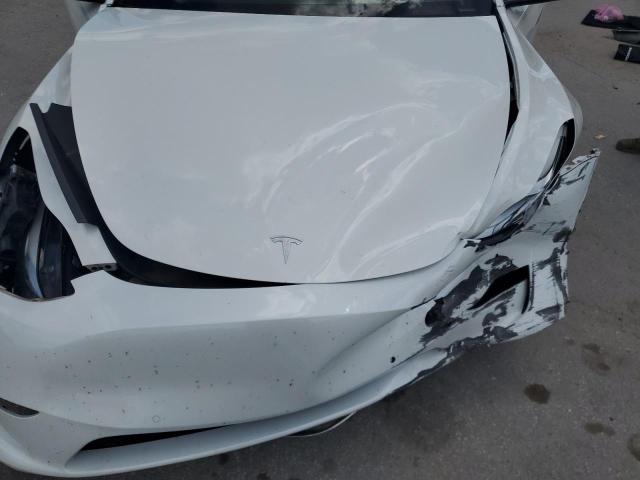 Photo 11 from auction – 2021 TESLA MODEL Y with VIN 5YJYGAEE9MF208815