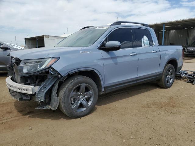 HONDA RIDGELINE 2022 with VIN 5FPYK3F73NB019208 - Photo from auction