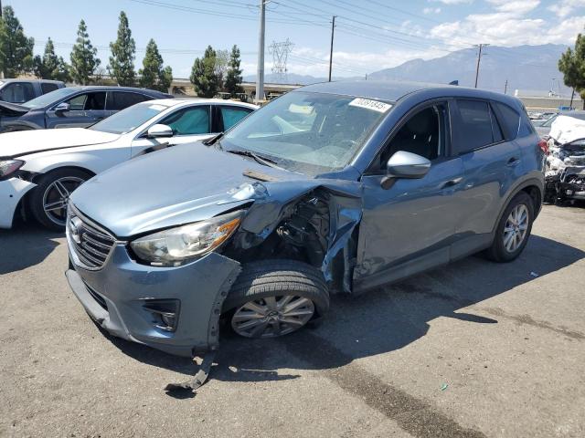 MAZDA CX-5 TOURI 2016 with VIN JM3KE2CY5G0813696 - Photo from auction