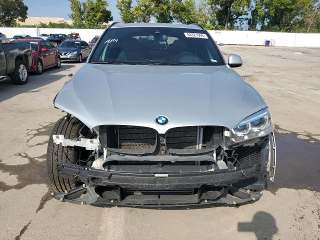 Photo 5 from auction – 2017 BMW X5 XDRIVE3 with VIN 5UXKR0C52H0V66340
